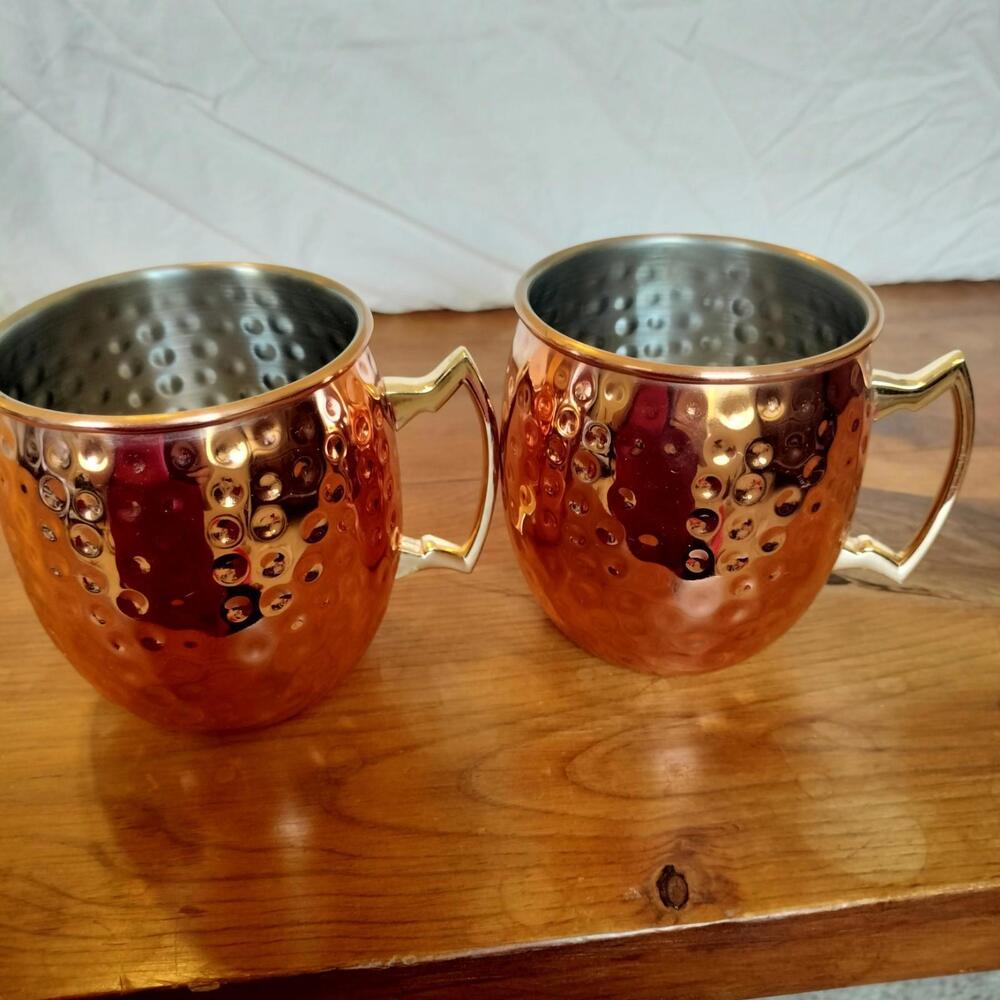 SIGNED "ECO ONE" HAMMERED COPPER MUGS WITH BRASS HANDLES - TWO